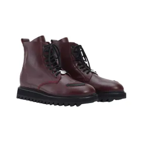 Sure! Here’s an optimized title for the e-commerce product:

Premium Burgundy Tomo Rubber Boots for Women - Comfortable Waterproof Footwear

Feel free to customize it further based on your target audience or specific features!